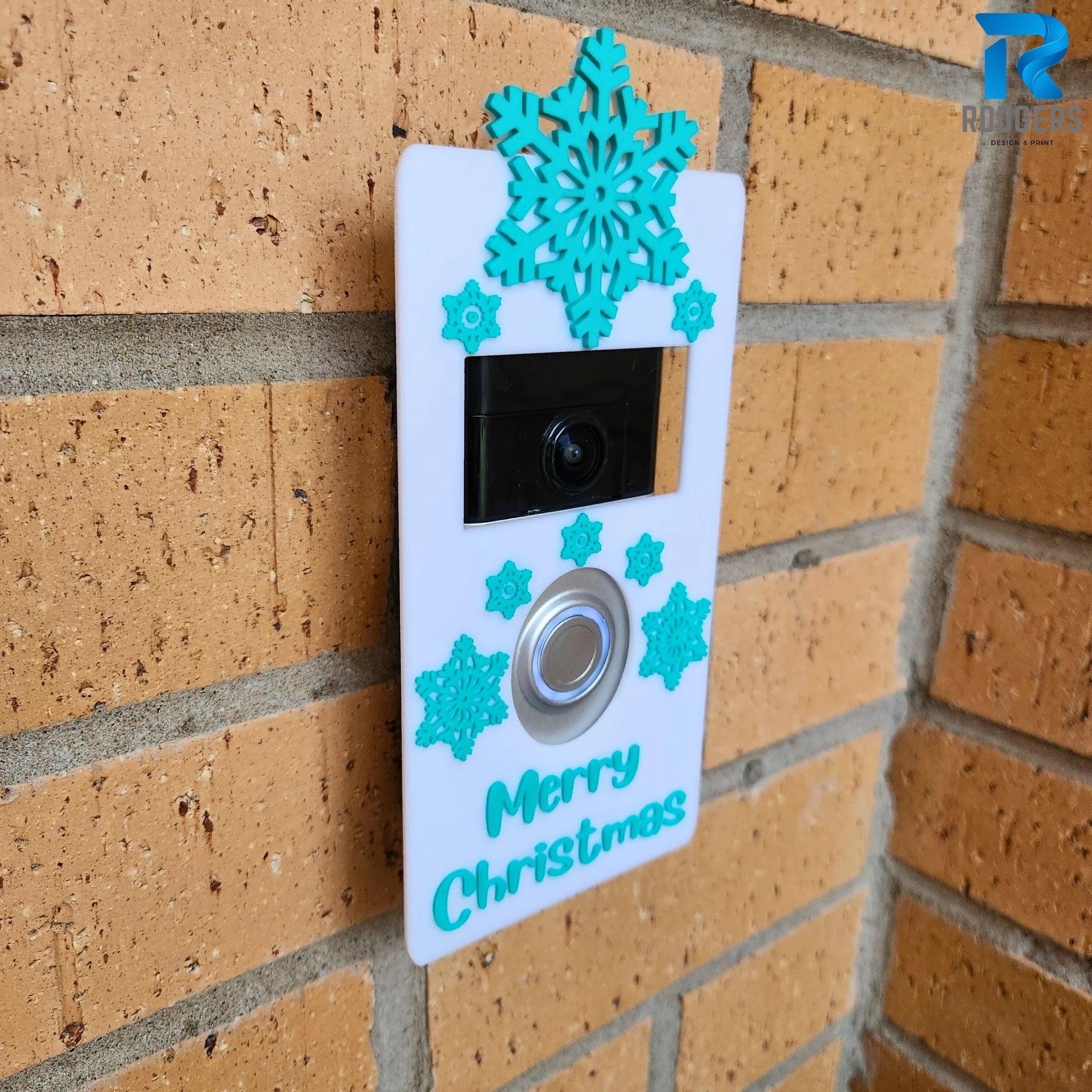 Side view of Christmas Ring Doorbell cover with peel-and-stick adhesive